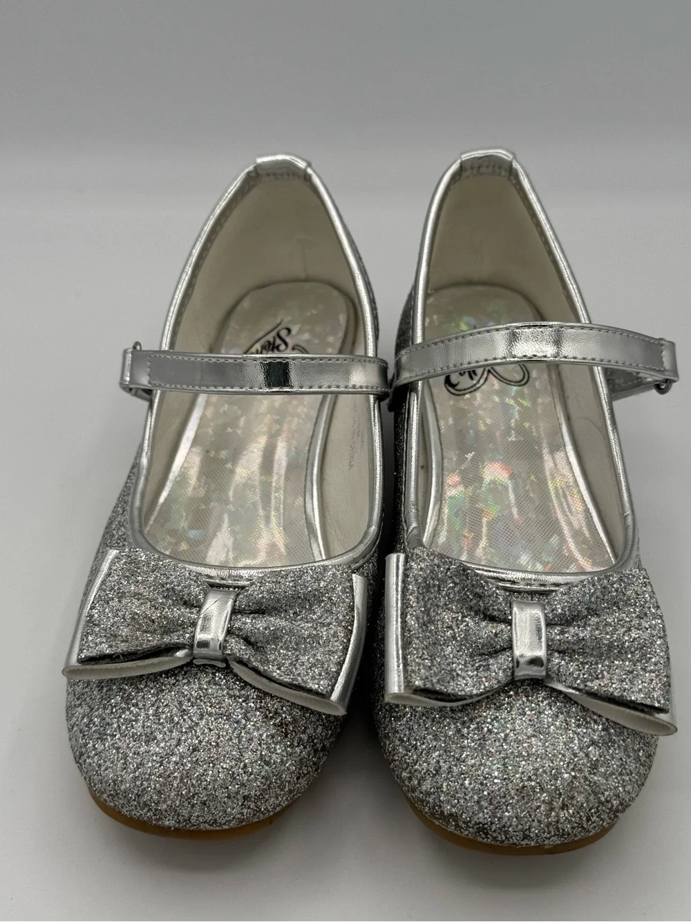 Stelle Mary Jane Silver Glitter Shoes with Prominent Bow